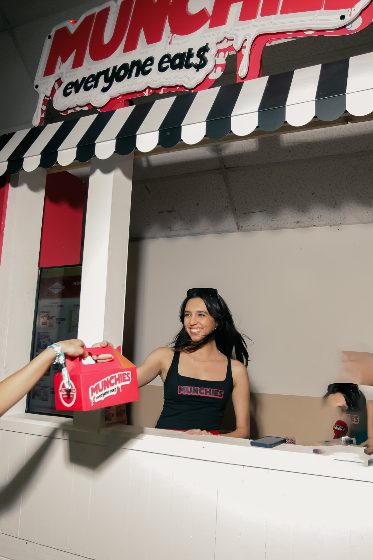 Serving the bodega window — every guest leaves with a box