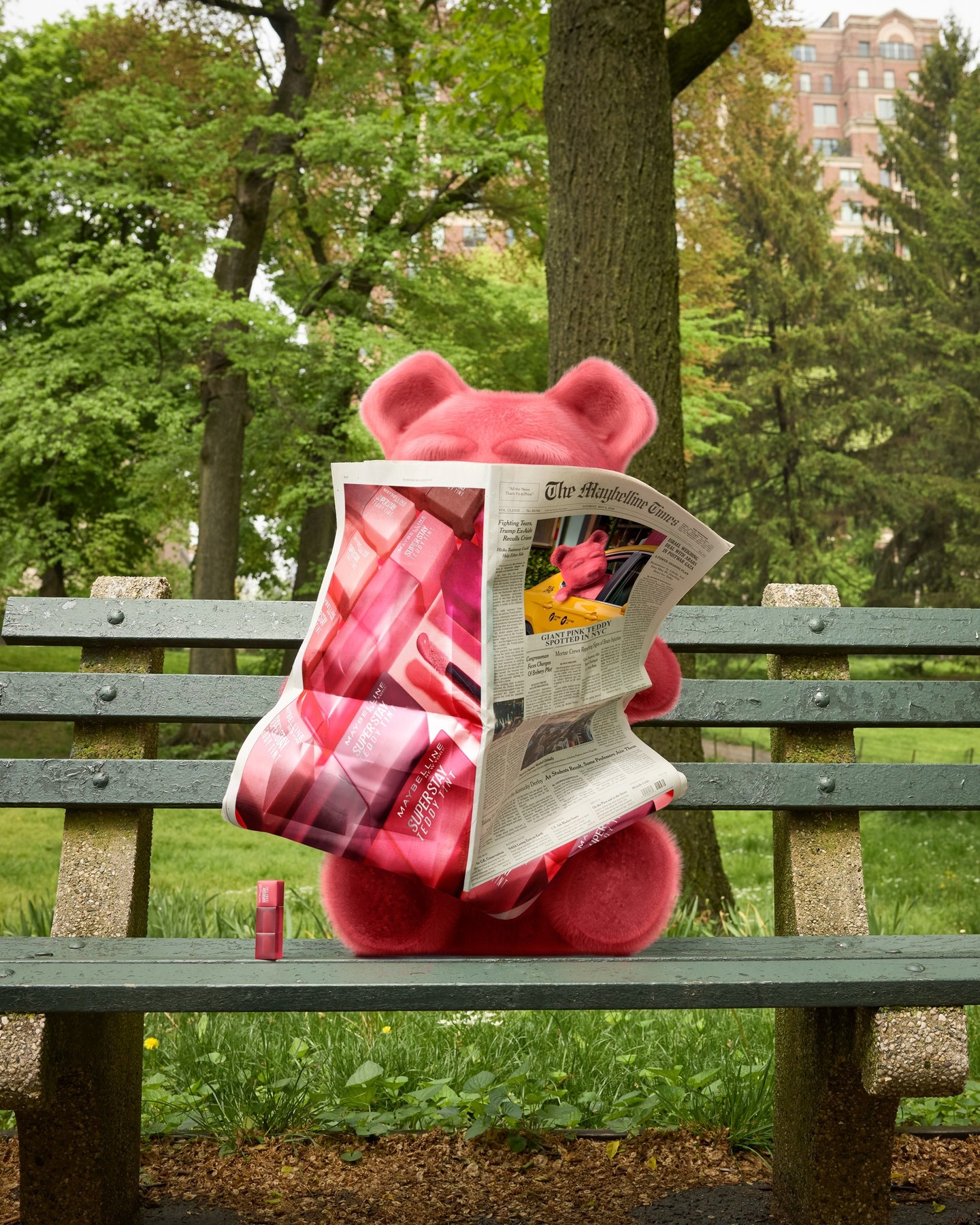 “Giant pink Teddy spotted in NYC” · park bench · carousel post