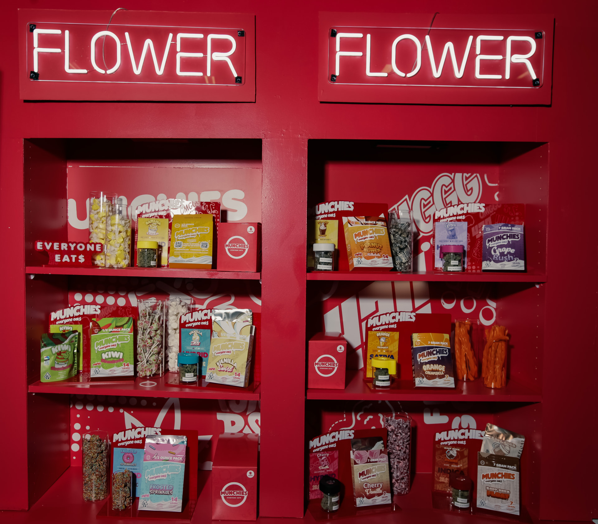 Neon flower wall — packaging-led merchandising system